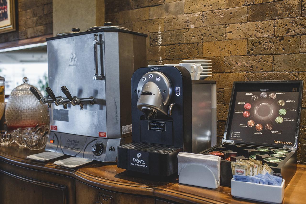Golden Lis Hotel Boutique Goiânia Exteriér fotografie A single serve coffee machine